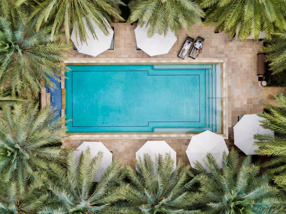 Jumeirah Dar Al Masyaf Dubai Ngoại thất bức ảnh Aerial view of the pool at the Four Seasons Hotel
